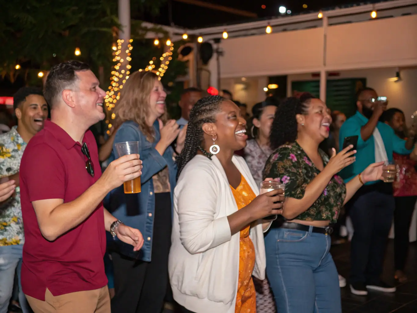 A photograph of a fan gathering, showing people socializing and enjoying music in a casual setting, highlighting the community aspect of SPEED ROCK MACHINE's events.